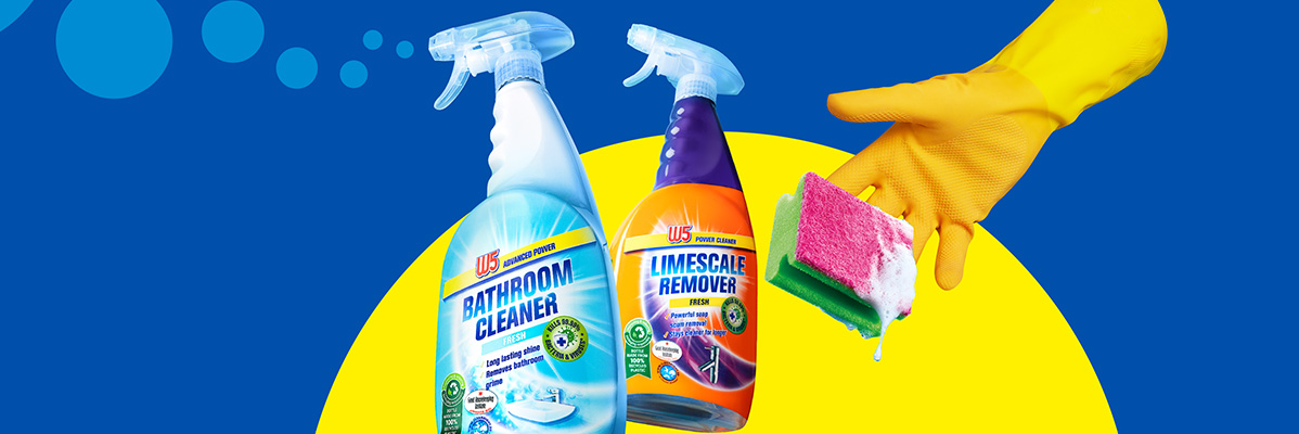 W5 bathroom cleaner and limescale remover with a gloved hand holding a sponge.