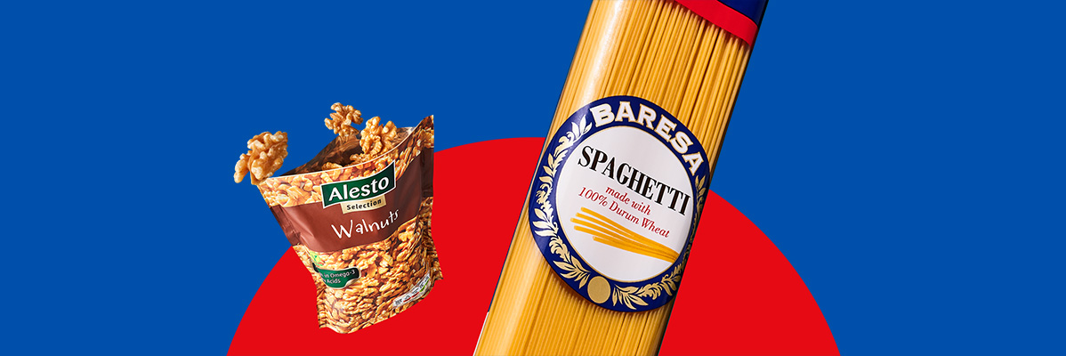 A bag of Alesto walnuts and a package of Albaresa spaghetti against a blue and red background.