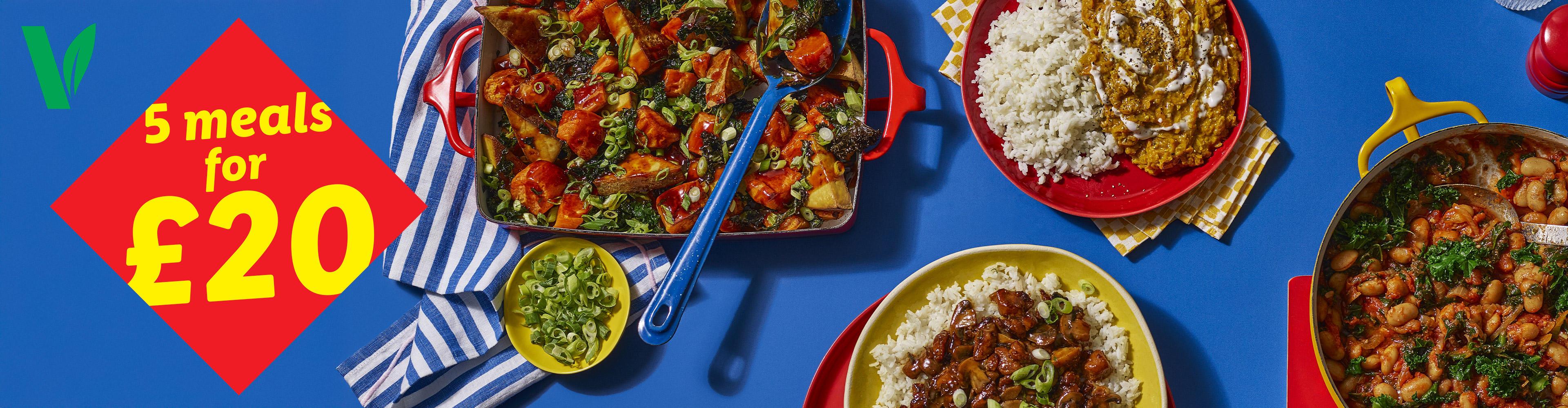 Vegan meals for £20, including a sweet potato dish, dal, and bean stew.