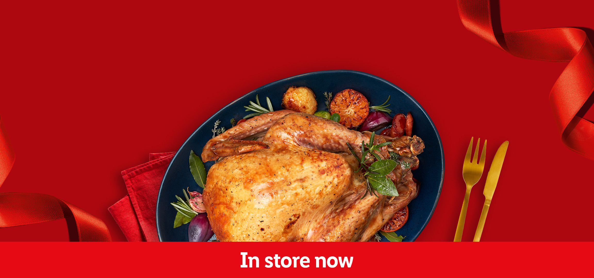 Roasted chicken and potatoes on a red background with 'In store now' text.