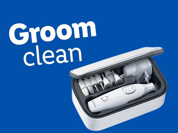 White manicure/pedicure set in an open case with the text 'Groom clean' on a blue background.