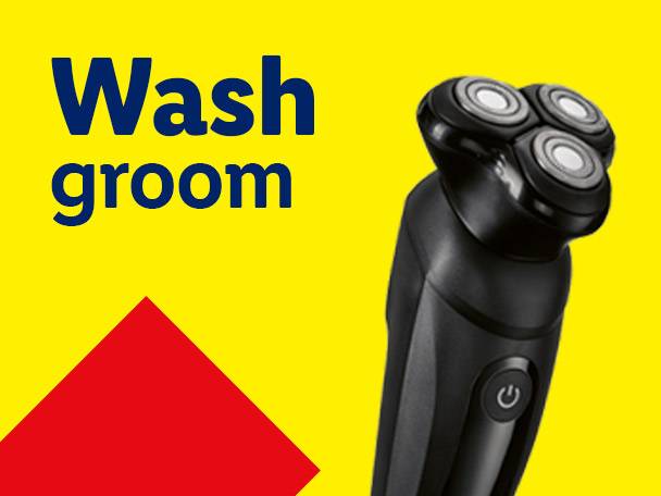Electric shaver with text 'Wash groom' on a yellow background with a red triangle.