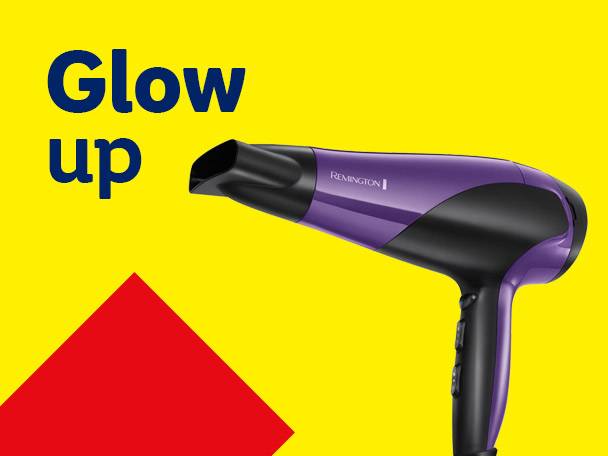 Purple hair dryer on a yellow background with 'Glow up' text and a red triangle.