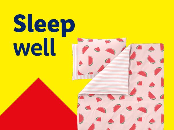 Pink watermelon-patterned bedding set with a striped reverse, and text 'Sleep well'.