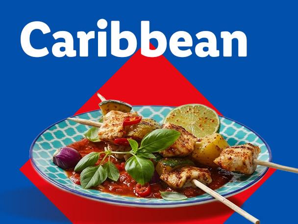 Caribbean chicken skewers with vegetables and sauce on a blue and red background with 'Caribbean' text.