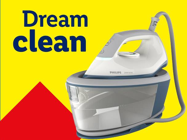 Steam iron with a water tank on a yellow background with text 'Dream clean' and a red triangle.