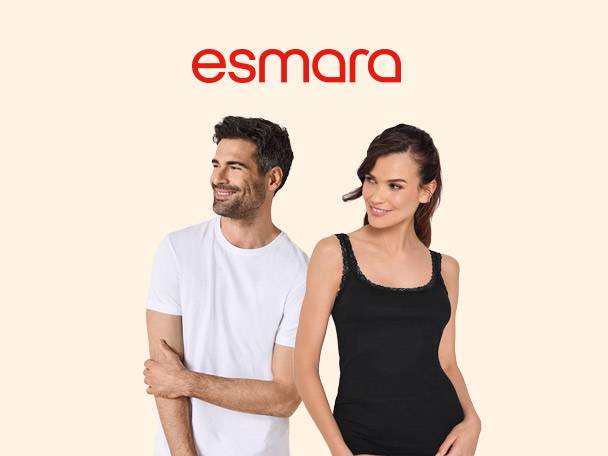 Man in white t-shirt and woman in black lace-trim camisole, smiling.