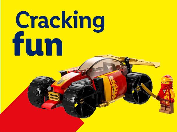 A red and gold toy car with a small toy figure holding a sword, on a yellow background with text 'Cracking fun'.