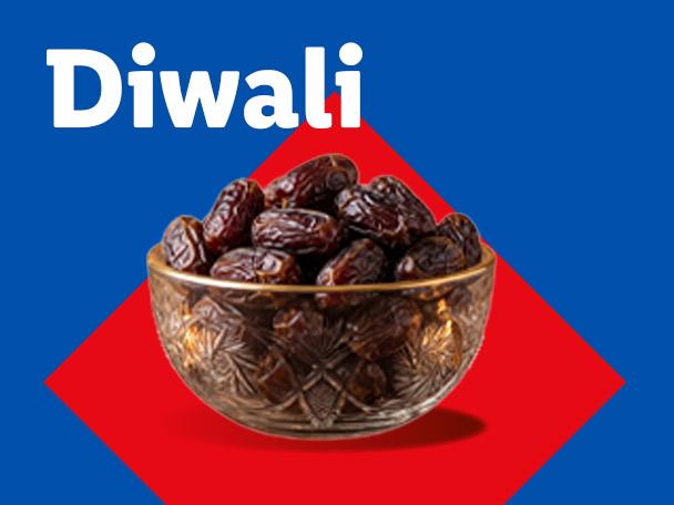 A bowl of dates on a red and blue background with the text Diwali.