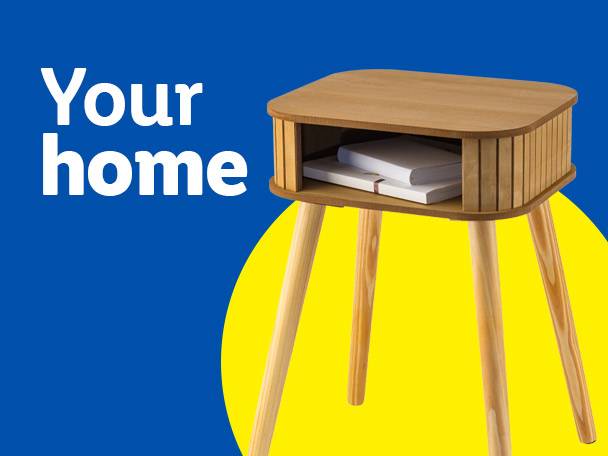 Wooden bedside table with books on a blue and yellow background, with text 'Your home'.