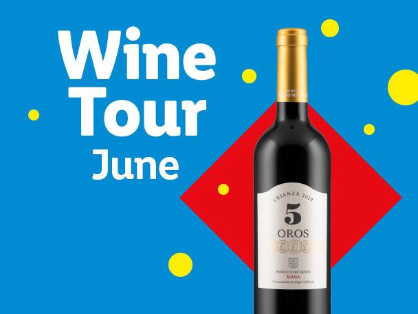 Red wine bottle with a white label, on a blue background with red diamond and yellow dots, with text 'Wine Tour June'.