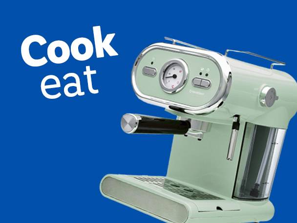 A light green espresso machine with a gauge and controls, with the words 'Cook eat' on a blue background.