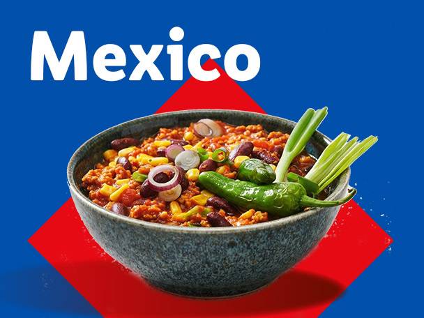 A bowl of chili con carne with corn, beans, onions, and green peppers, with the word 'Mexico' above.
