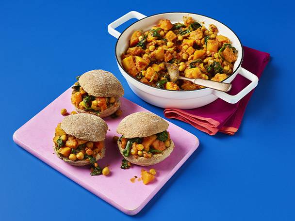 Sweet potato and chickpea sliders with a pot of the filling.