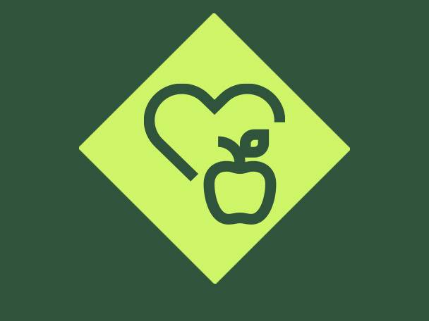 A heart and an apple icon on a light green diamond shape, symbolizing health and wellness.