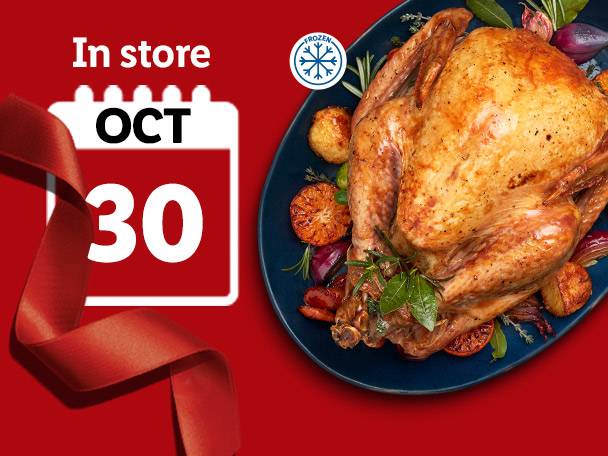 Roasted turkey on a platter with vegetables, next to a calendar showing 'In store OCT 30' and a frozen symbol.