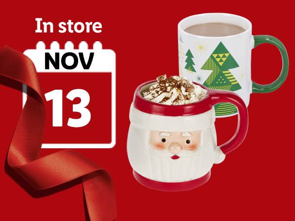 Two Christmas mugs, one Santa-shaped and one with a tree pattern, available in store November 13.