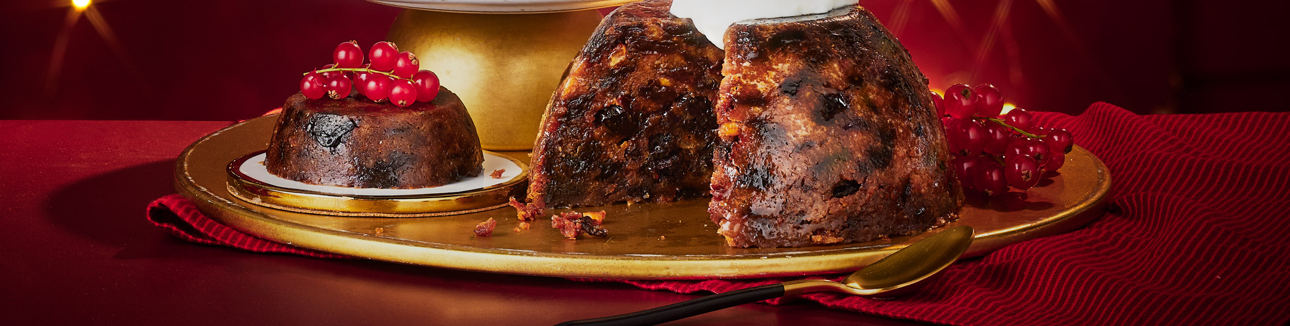 Christmas pudding on a gold platter.