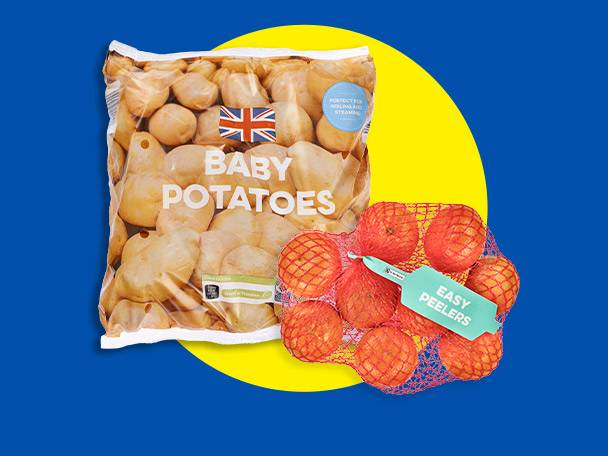 Bag of baby potatoes and a net of easy peelers on a blue and yellow background.