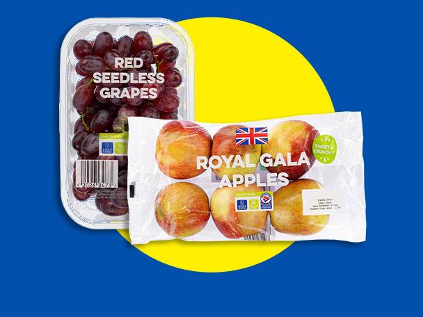 Red seedless grapes in a clear plastic container and a bag of Royal Gala apples.