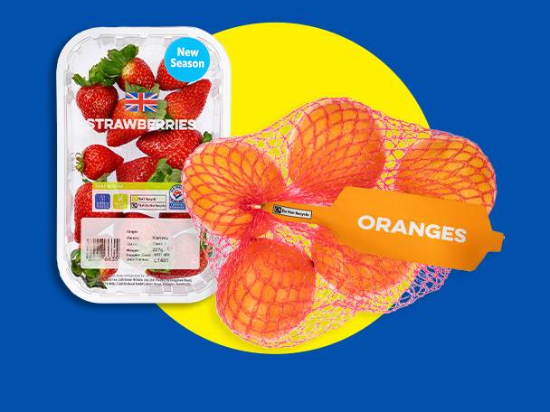 Strawberries in a clear plastic container and oranges in a mesh bag, both with labels.