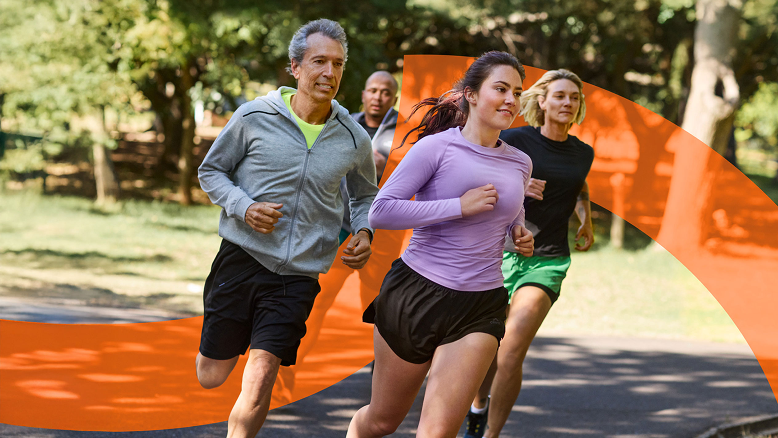 People jogging outdoors.
