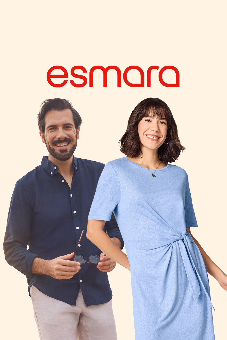 Man in a navy shirt and woman in a light blue dress, both smiling.