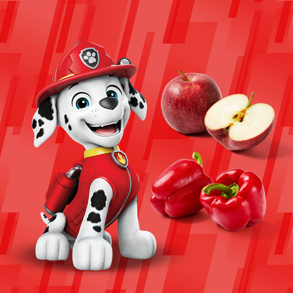 Paw Patrol's Marshall with apples and red bell peppers on a red background.