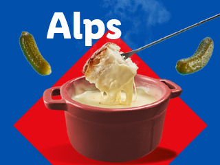 A pot of fondue with bread and pickles, with the word 'Alps' above it.