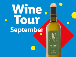 A bottle of Hacienda Uvanis white wine with text 'Wine Tour September'.