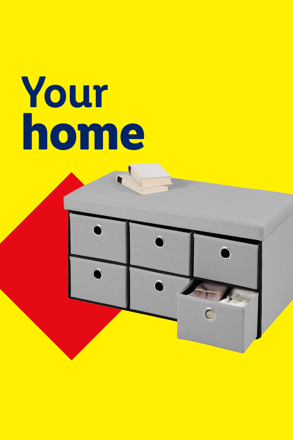 Grey storage bench with six drawers, one open with clothes, and books on top, with text 'Your home'.