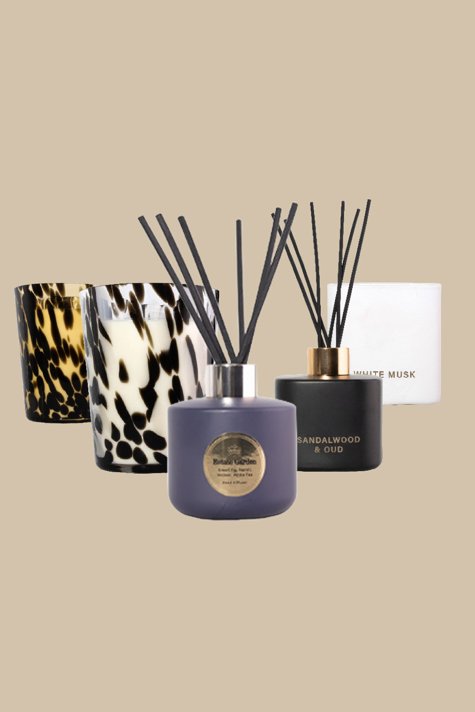 A selection of scented candles and reed diffusers, including Sandalwood & Oud and White Musk.