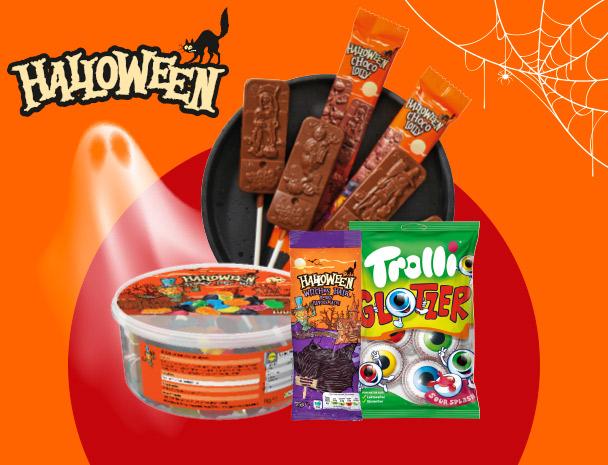 A selection of Halloween-themed sweets, including chocolate lollipops and gummy eyeballs.