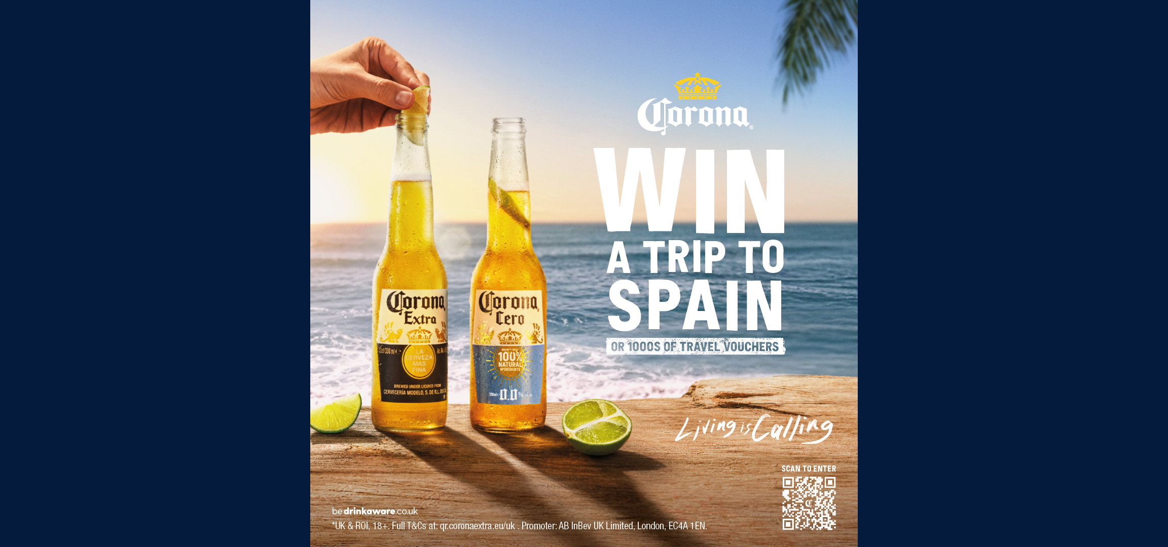 Two beer bottles with lime on a wooden surface by the sea, advertising a trip to Spain.