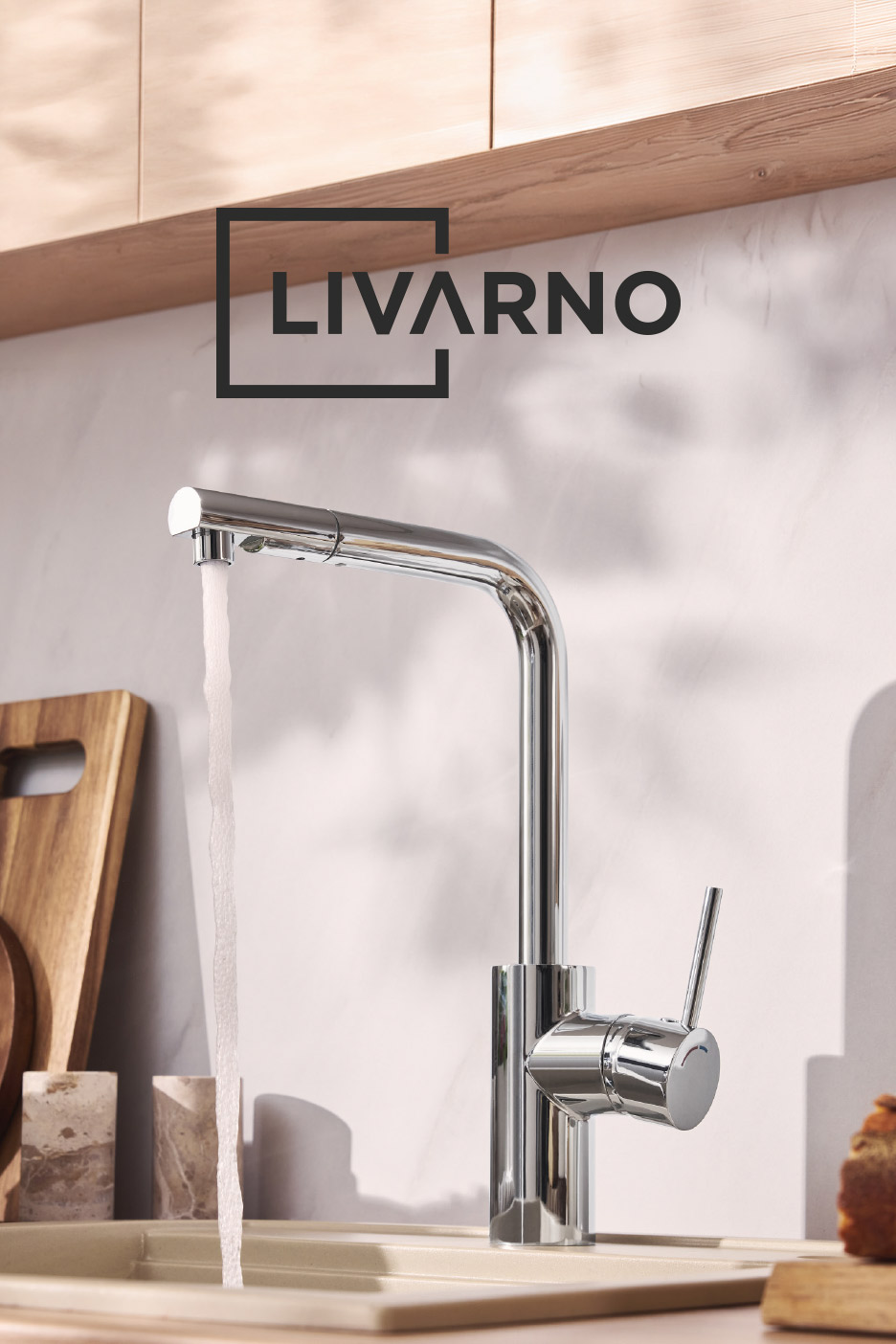Chrome kitchen faucet with running water in a modern kitchen setting, with the text 'LIVARNO'.