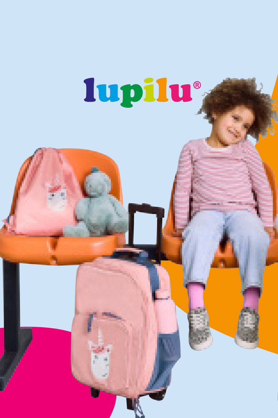 Child's pink unicorn backpack and drawstring bag with a teddy bear, next to a child on a bench.