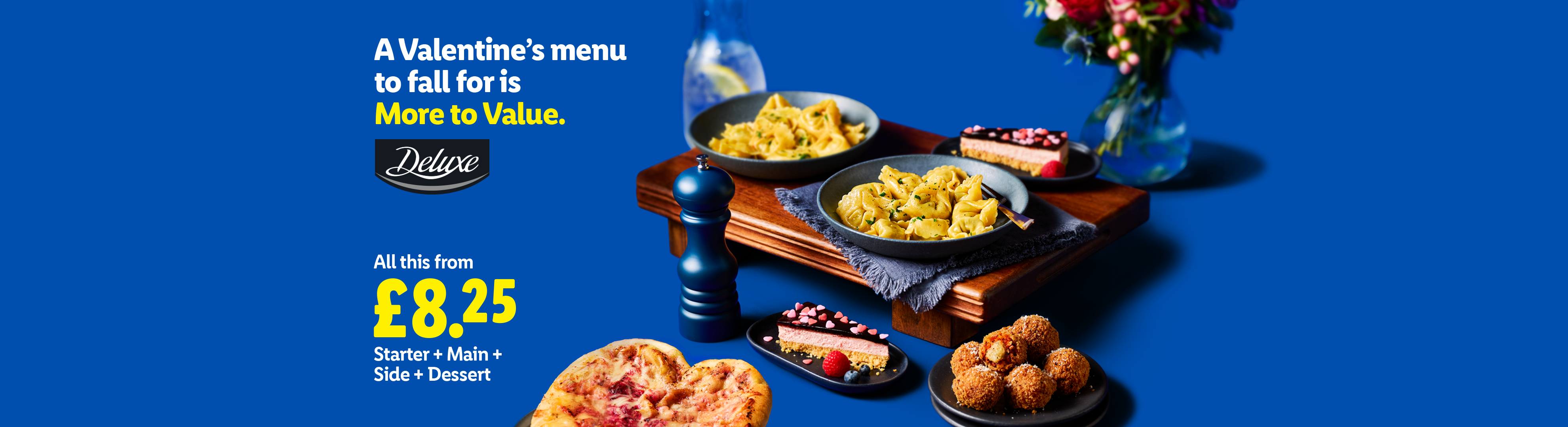 Valentine's menu featuring pasta, cheesecake, and a heart-shaped pizza, priced from £8.25 for a starter, main, side, and dessert.