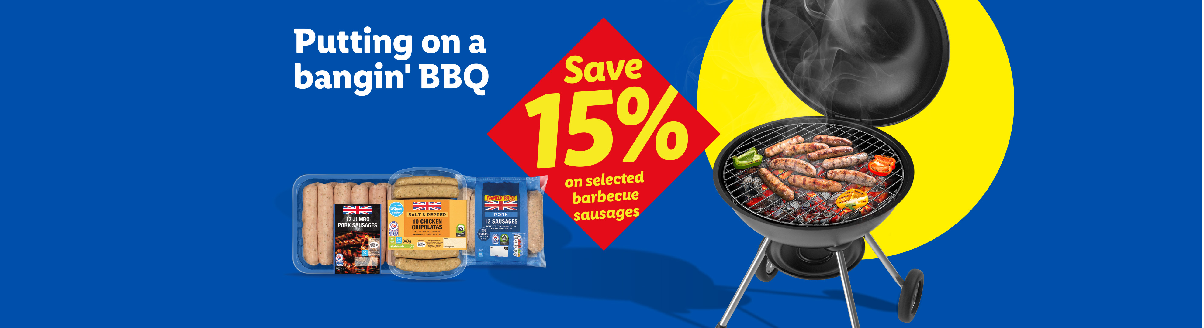 Barbecue sausages on a grill with a 15% off promotion, and packages of pork and chicken sausages.