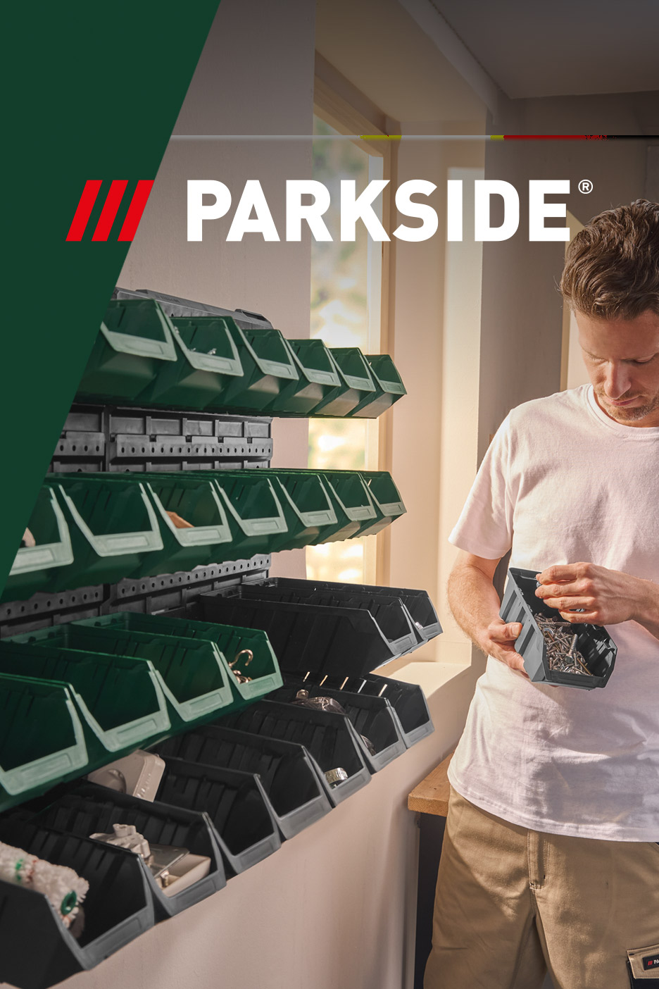 Man organizing screws into storage bins on a wall-mounted system.