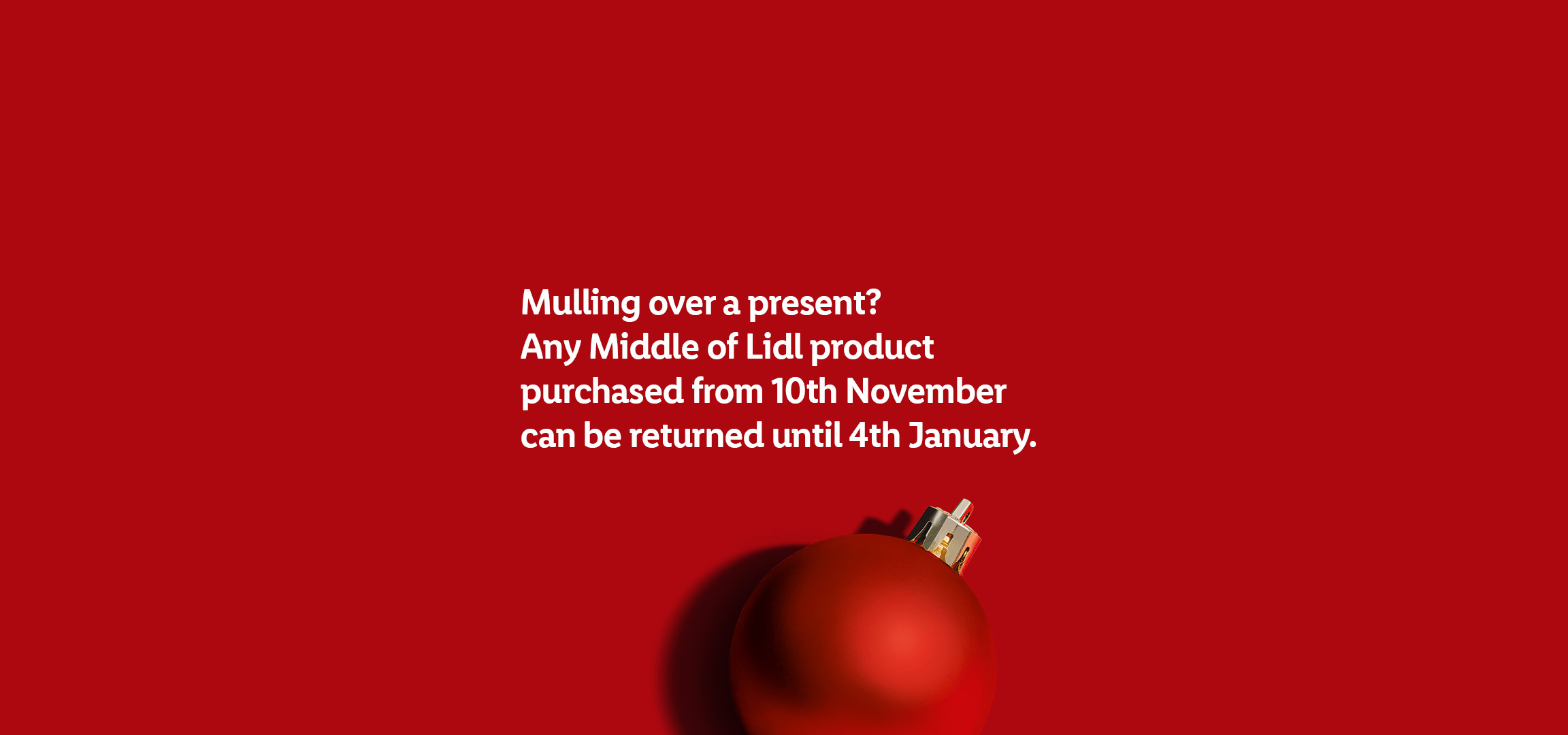 Christmas baubles on red background with text about extended returns for Lidl products.