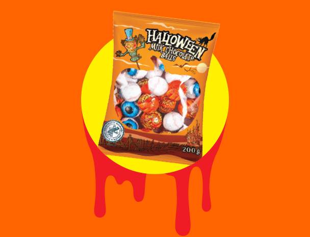 Halloween-themed milk chocolate balls in a bag, featuring a scarecrow and cat.