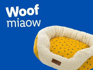 Yellow and cream pet bed with bee print from Woof miaow.
