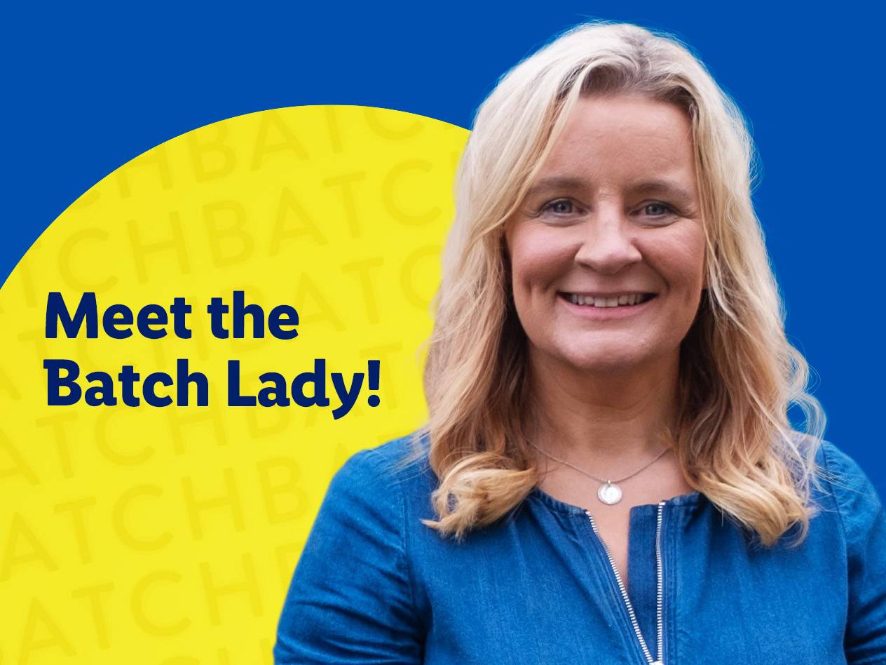 Smiling woman with blonde hair, wearing a denim top, with text: 'Meet the Batch Lady!'