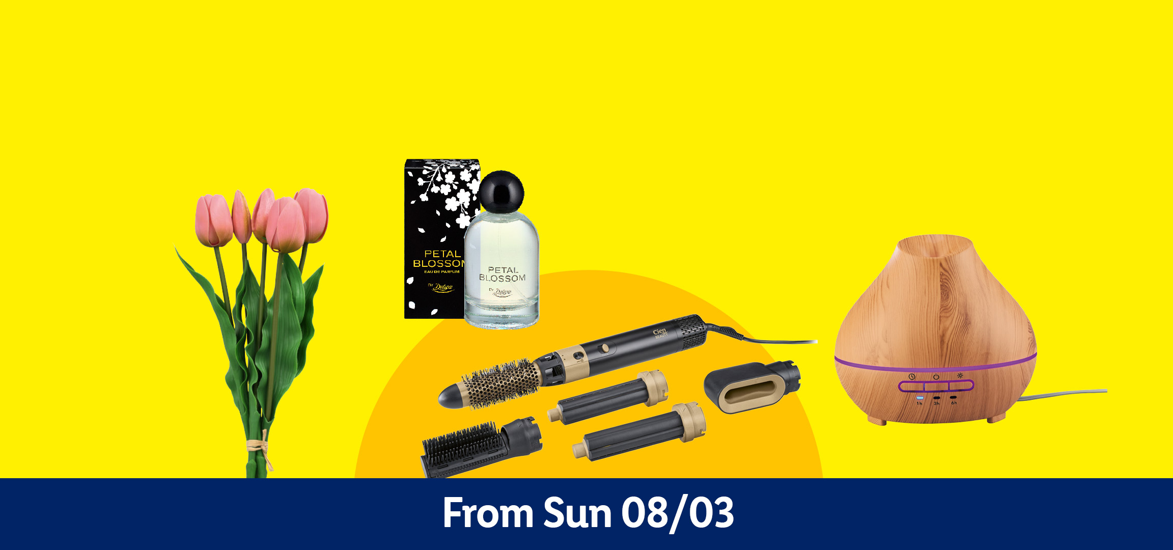 Hair styler, perfume, tulips, and an aroma diffuser on a yellow and blue background. From Sun 08/03.
