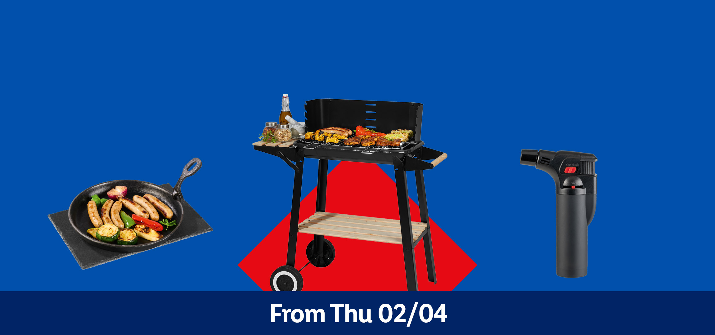 Grill with food, cleaning brush, frying pan with sausages, and a gas torch. From Thu 02/04.