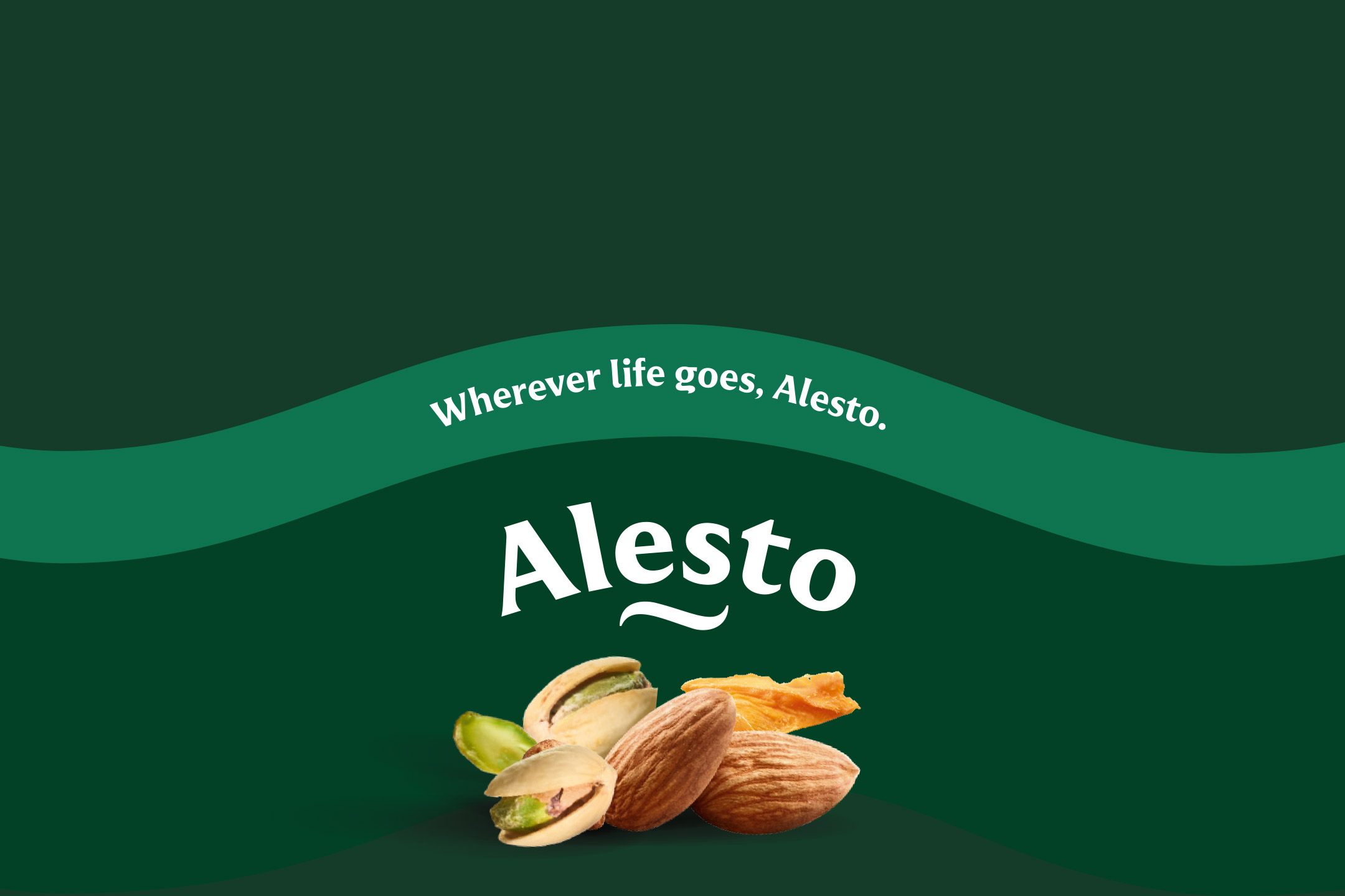 Pistachios, almonds, and dried mango on a dark green background with the text 'Wherever life goes, Alesto.'