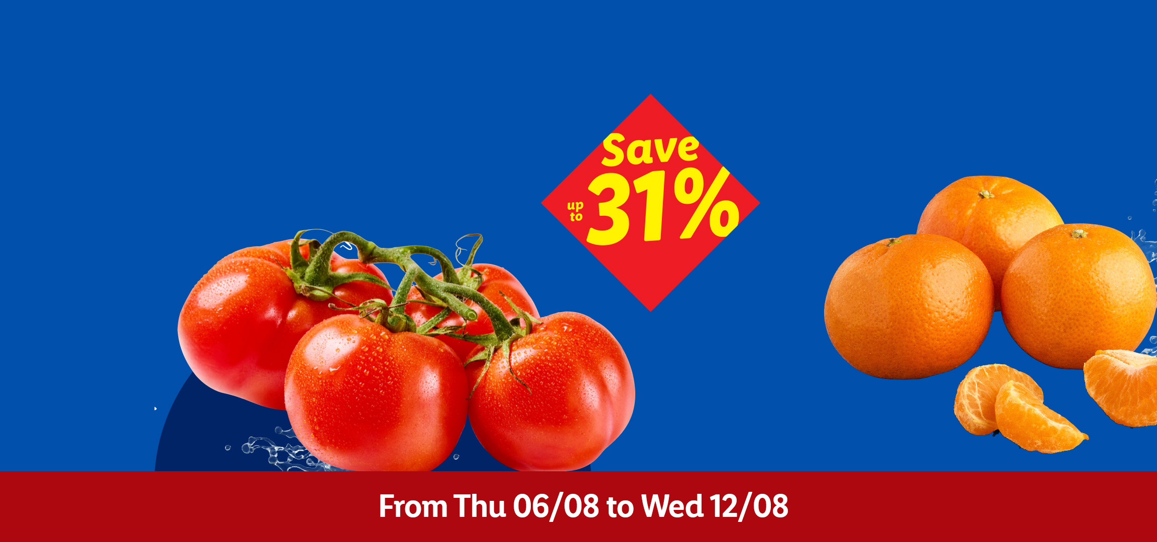 Fresh grapes, tomatoes, and oranges with water splashes, advertising a sale of up to 31% off.