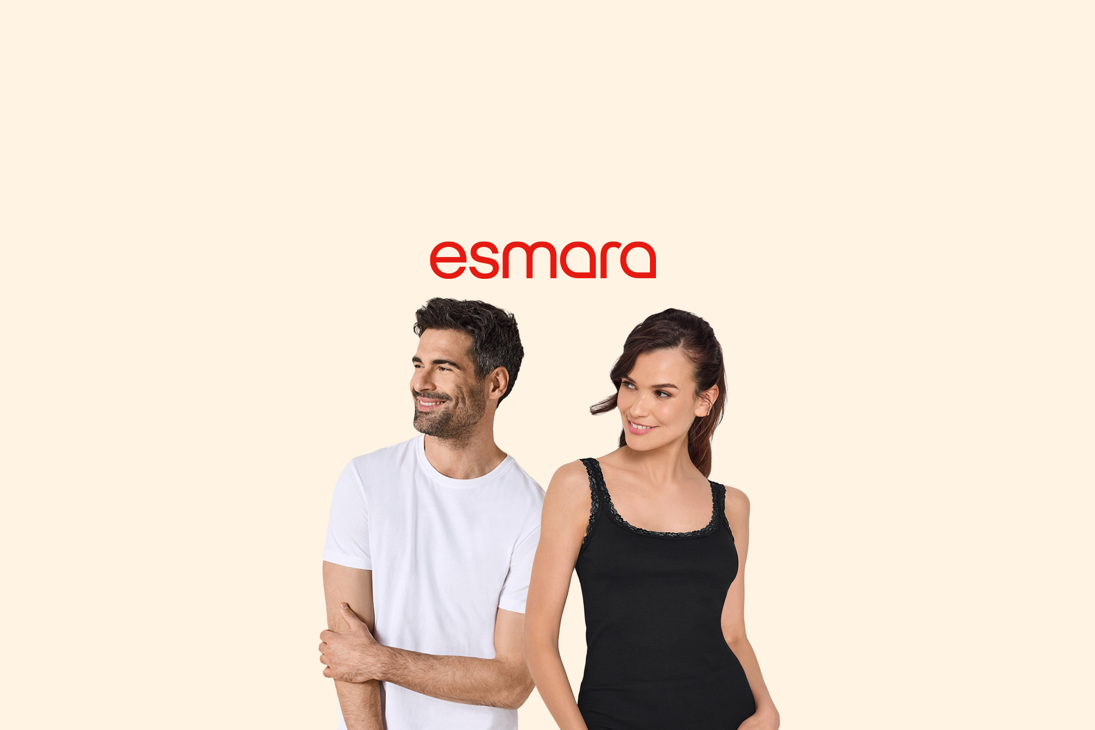 Man in white t-shirt and woman in black lace-trim camisole, smiling.