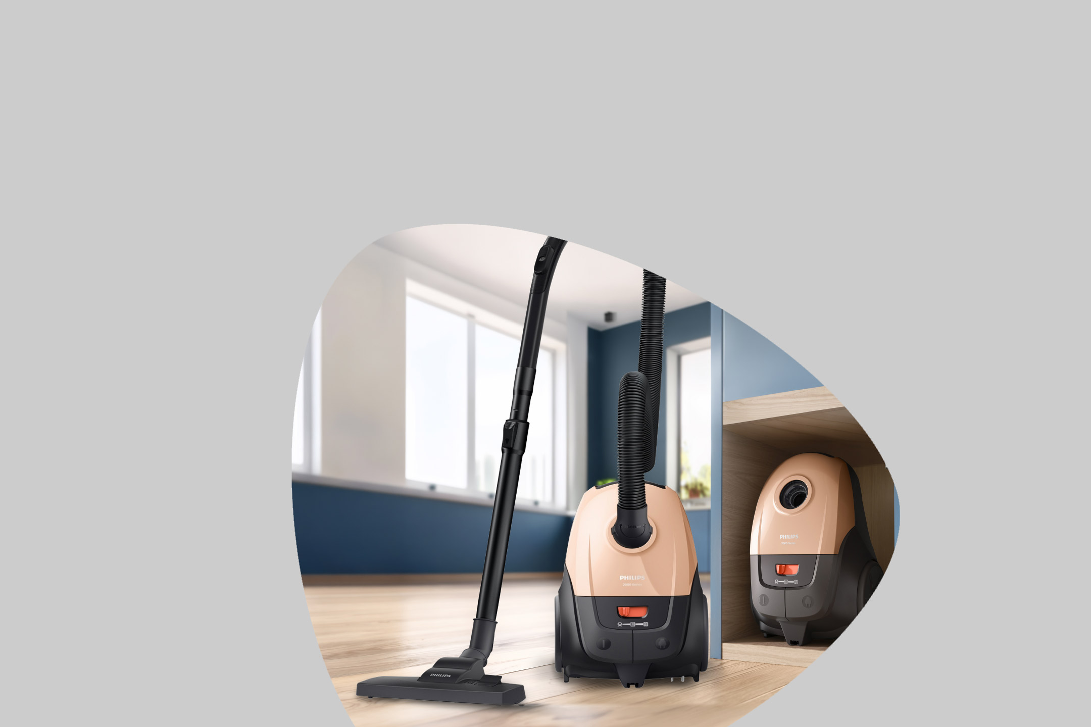 Two vacuum cleaners, one in use and one stored in a cabinet, on a light gray background.