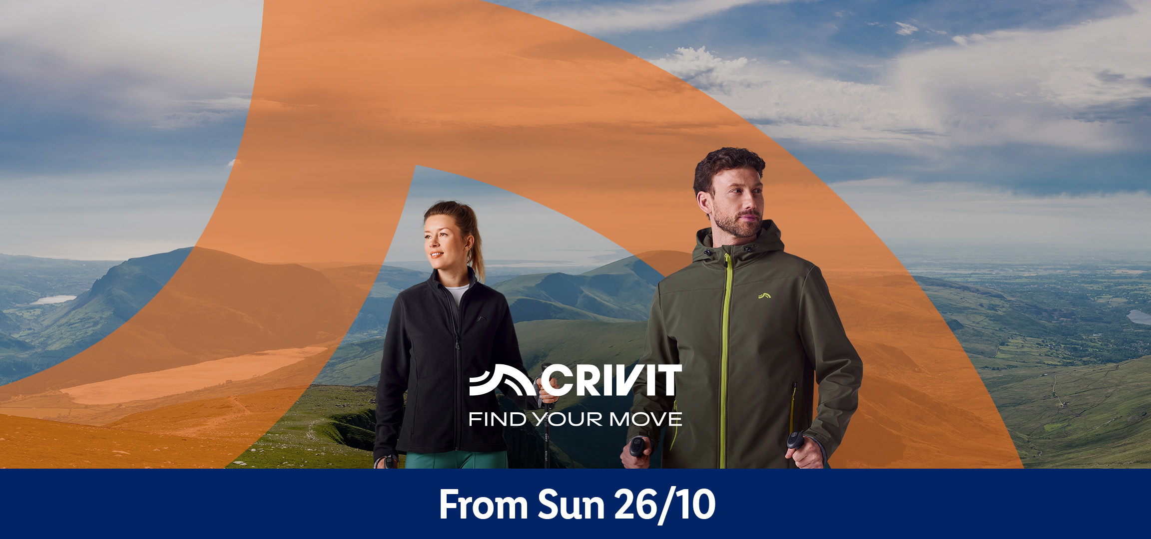 Two hikers in Crivit outdoor jackets and fleeces, with walking poles, in a mountain landscape.